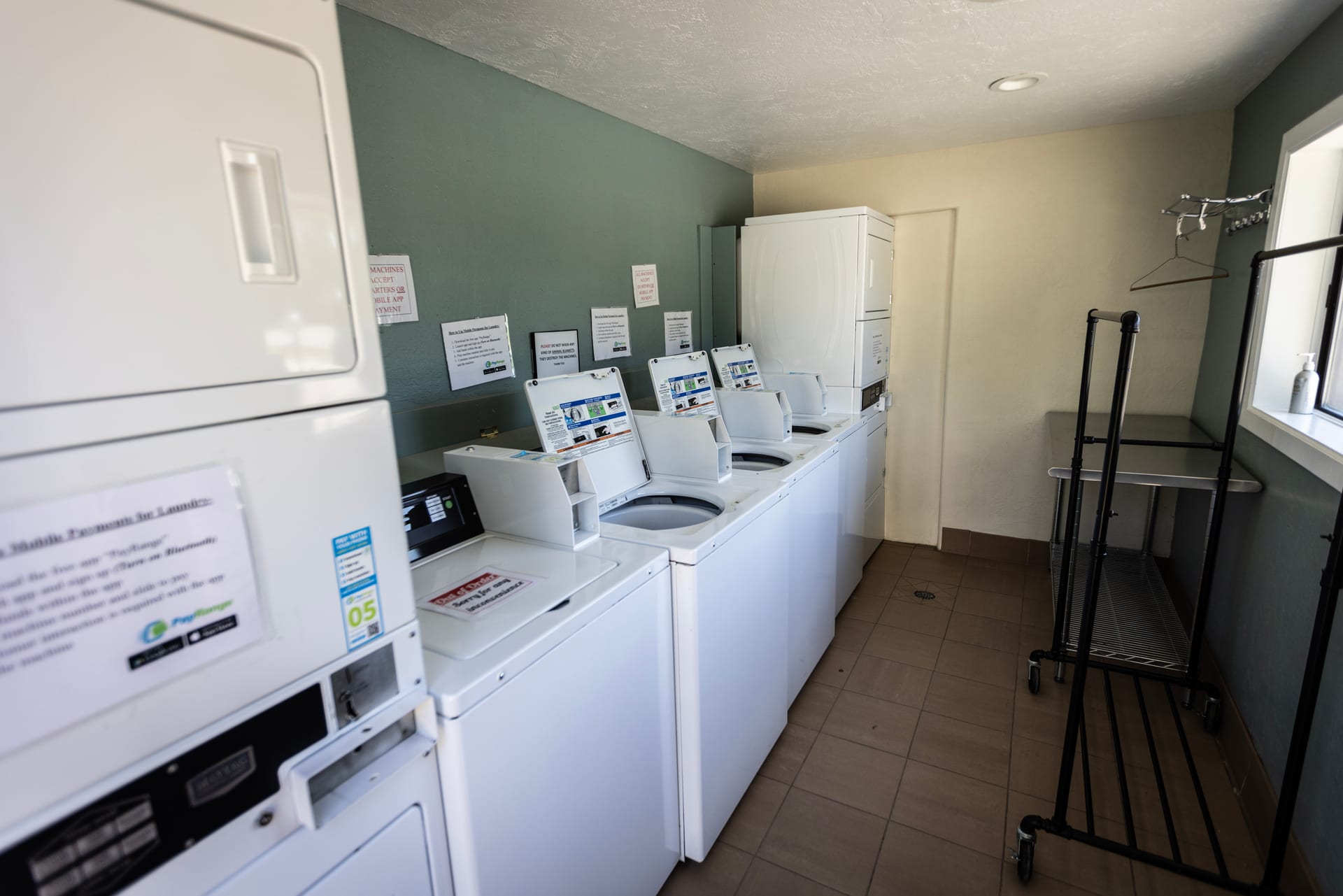 On-site coin laundry with washers and dryers