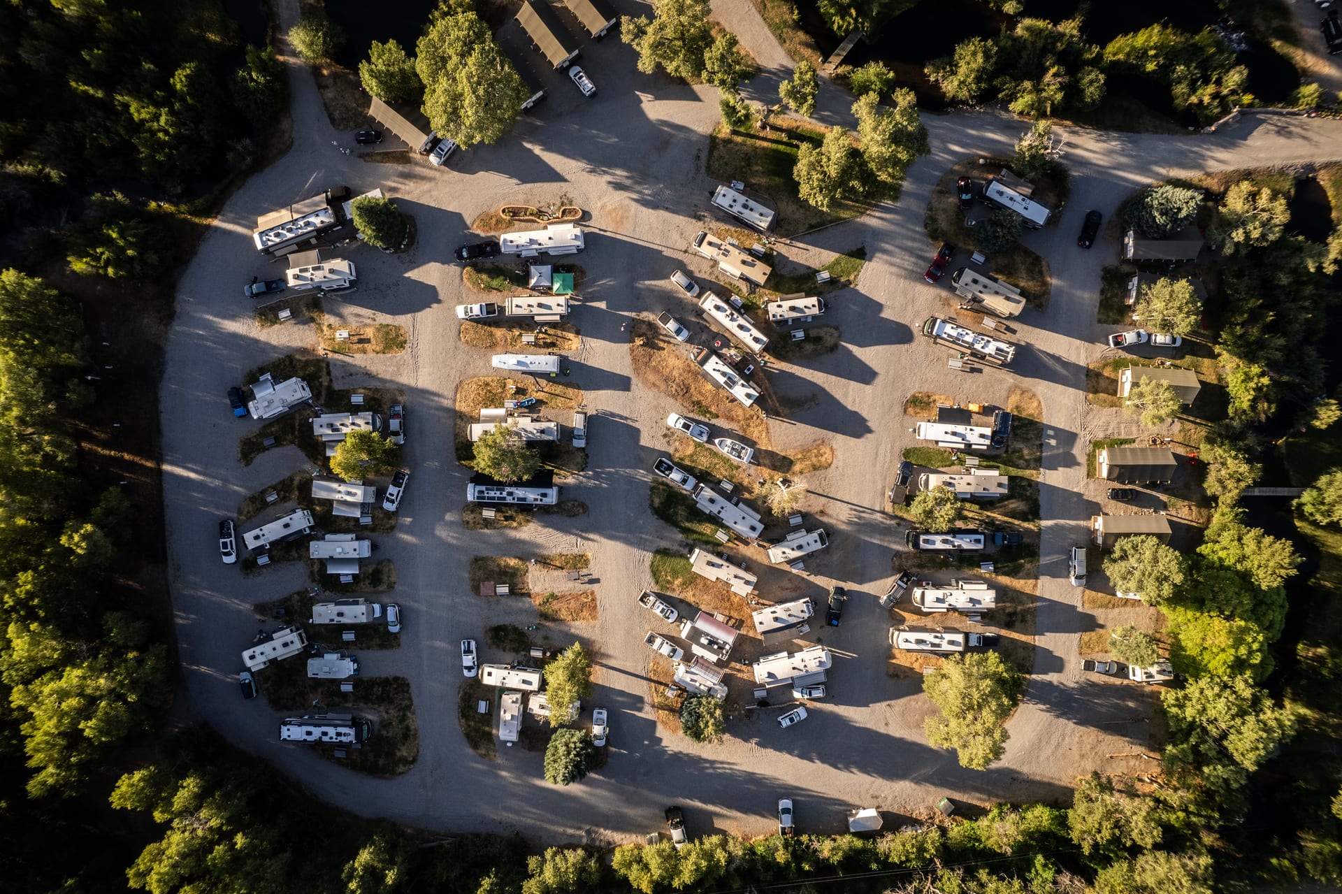 Aerial view of the RV loop at Outdoorsy Bayfield showing more than thirty rigs in pull-through sites